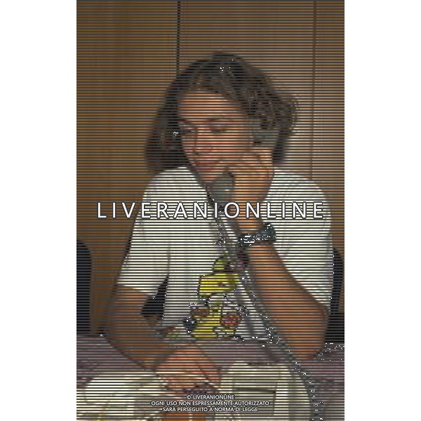 01-09-1997 MILANO REDAZIONE DELLA GAZZETTA DELLO SPORT IN VIA SOLFERINO 28 VISITA DEL CAMPIONE DI MOTOCICLISMO VALENTINO ROSSI NELLA FOTO VALENTINO ROSSI AG ALDO LIVERANI SAS