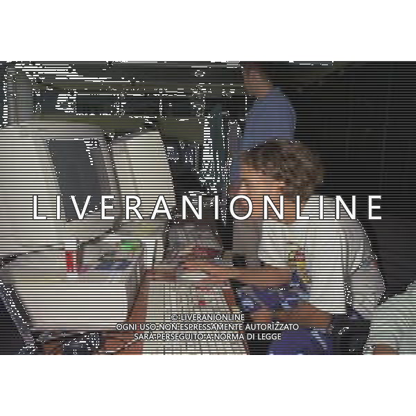 01-09-1997 MILANO REDAZIONE DELLA GAZZETTA DELLO SPORT IN VIA SOLFERINO 28 VISITA DEL CAMPIONE DI MOTOCICLISMO VALENTINO ROSSI NELLA FOTO VALENTINO ROSSI AG ALDO LIVERANI SAS