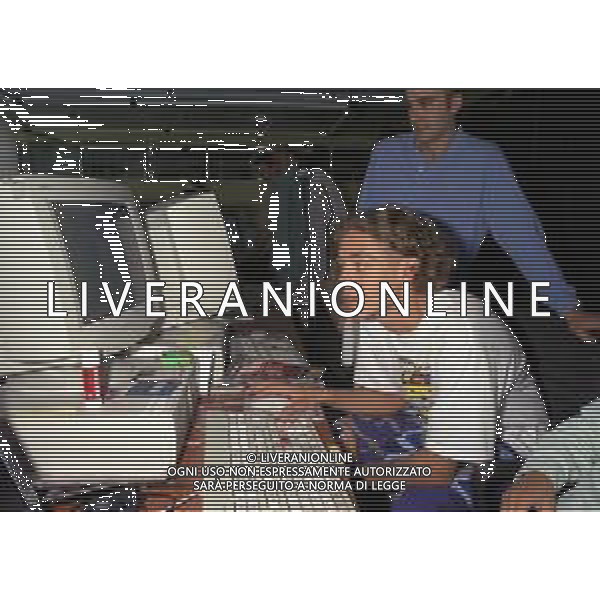 01-09-1997 MILANO REDAZIONE DELLA GAZZETTA DELLO SPORT IN VIA SOLFERINO 28 VISITA DEL CAMPIONE DI MOTOCICLISMO VALENTINO ROSSI NELLA FOTO VALENTINO ROSSI AG ALDO LIVERANI SAS