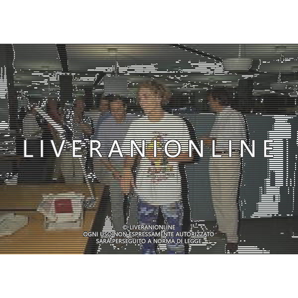 01-09-1997 MILANO REDAZIONE DELLA GAZZETTA DELLO SPORT IN VIA SOLFERINO 28 VISITA DEL CAMPIONE DI MOTOCICLISMO VALENTINO ROSSI NELLA FOTO VALENTINO ROSSI AG ALDO LIVERANI SAS