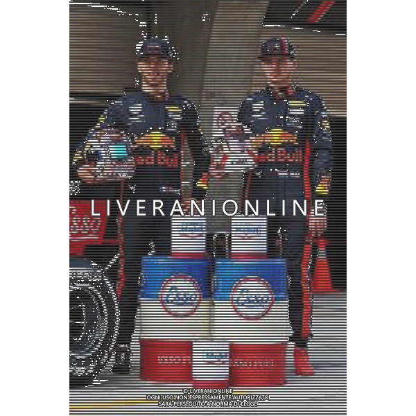 (L to R): Pierre Gasly (FRA) Red Bull Racing and Max Verstappen (NLD) Red Bull Racing celebrate 1000 F1 races with Esso and Mobil. 11.04.2019. Formula 1 World Championship, Rd 3, Chinese Grand Prix, Shanghai, China, Preparation Day. / AGENZIA ALDO LIVERANI SAS - ITALY ONLY EDITORIAL USE ONLY - Gp F1 Cina Shanghai Prove Libere 12.04.2019