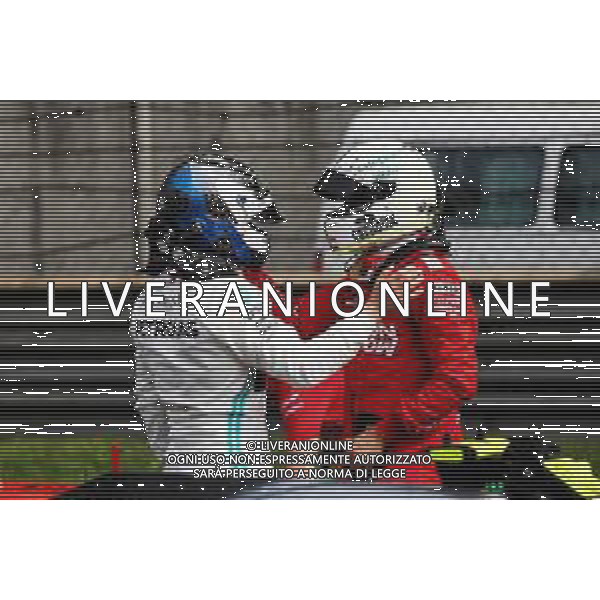 (L to R): Valtteri Bottas (FIN) Mercedes AMG F1 celebrates his pole position with third placed Sebastian Vettel (GER) Ferrari in qualifying parc ferme. 13.04.2019. Formula 1 World Championship, Rd 3, Chinese Grand Prix, Shanghai, China, Qualifying Day.