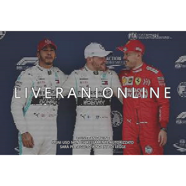 Qualifying top three in parc ferme (L to R): Lewis Hamilton (GBR) Mercedes AMG F1, second; Valtteri Bottas (FIN) Mercedes AMG F1, pole position; Sebastian Vettel (GER) Ferrari, third. 13.04.2019. Formula 1 World Championship, Rd 3, Chinese Grand Prix, Shanghai, China, Qualifying Day.