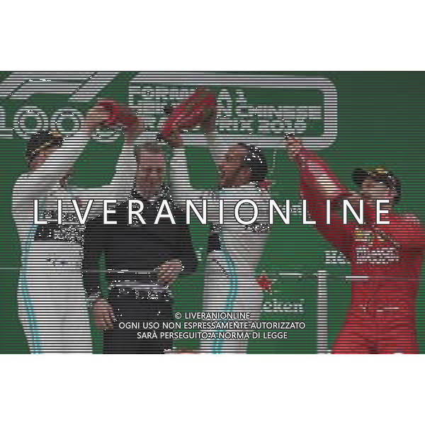 1st place Lewis Hamilton (GBR) Mercedes AMG F1 W10 with 2nd place Valtteri Bottas (FIN) Mercedes AMG F1 W10 and 3rd place Sebastian Vettel (GER) Ferrari SF90. 14.04.2019. Formula 1 World Championship, Rd 3, Chinese Grand Prix, Shanghai, China, Race Day. AG ALDO LIVERANI SAS-ONLY ITALY