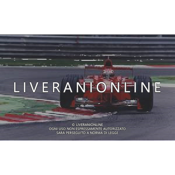 RETROSPETTIVA EDDIE IRVINE PILOTA F1 NELLA FOTO EDDIE IRVINE NEL 1998 CON LA FERRARI F 300 AG ALDO LIVERANI SAS