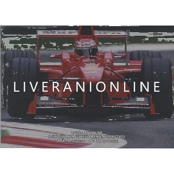 RETROSPETTIVA EDDIE IRVINE PILOTA F1 NELLA FOTO EDDIE IRVINE NEL 1998 CON LA FERRARI F 300 AG ALDO LIVERANI SAS