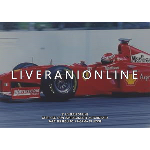 RETROSPETTIVA EDDIE IRVINE PILOTA F1 NELLA FOTO EDDIE IRVINE NEL 1998 CON LA FERRARI F 300 AG ALDO LIVERANI SAS