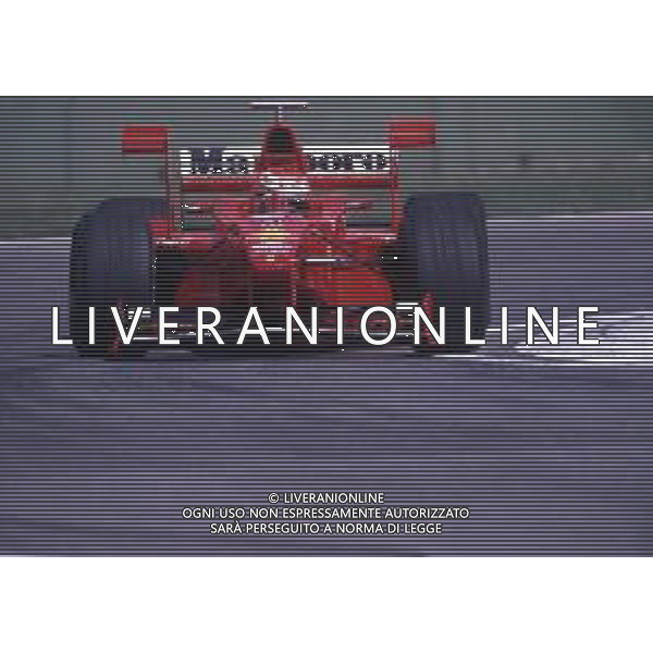RETROSPETTIVA EDDIE IRVINE PILOTA F1 NELLA FOTO EDDIE IRVINE NEL 1998 CON LA FERRARI F 300 AG ALDO LIVERANI SAS