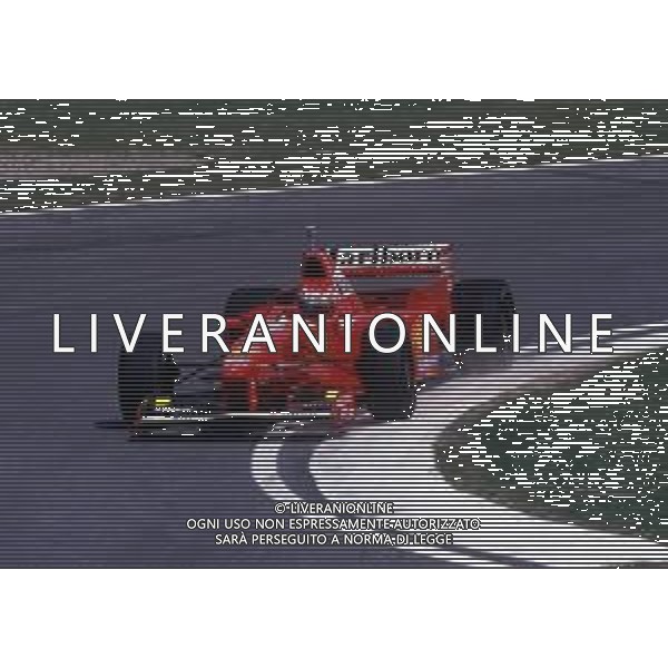 RETROSPETTIVA EDDIE IRVINE PILOTA F1 NELLA FOTO EDDIE IRVINE NEL 1997 CON LA FERRARI F 310 B AG ALDO LIVERANI SAS 