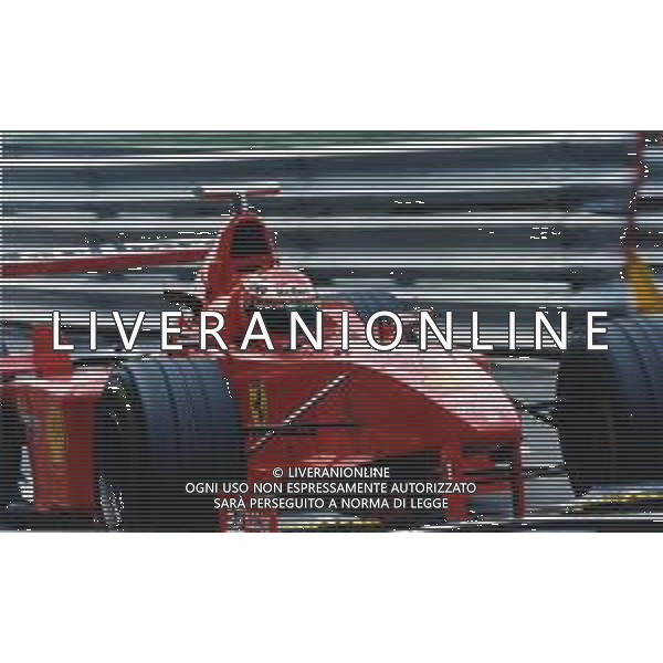 RETROSPETTIVA EDDIE IRVINE PILOTA F1 NELLA FOTO EDDIE IRVINE NEL 1997 CON LA FERRARI F 310 B AG ALDO LIVERANI SAS 