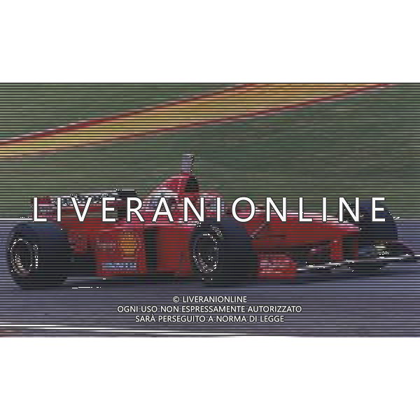RETROSPETTIVA EDDIE IRVINE PILOTA F1 NELLA FOTO EDDIE IRVINE NEL 1997 CON LA FERRARI F 310 B AG ALDO LIVERANI SAS 