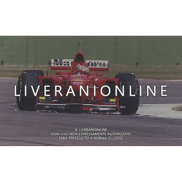 RETROSPETTIVA EDDIE IRVINE PILOTA F1 NELLA FOTO EDDIE IRVINE NEL 1997 CON LA FERRARI F 310 B AG ALDO LIVERANI SAS 