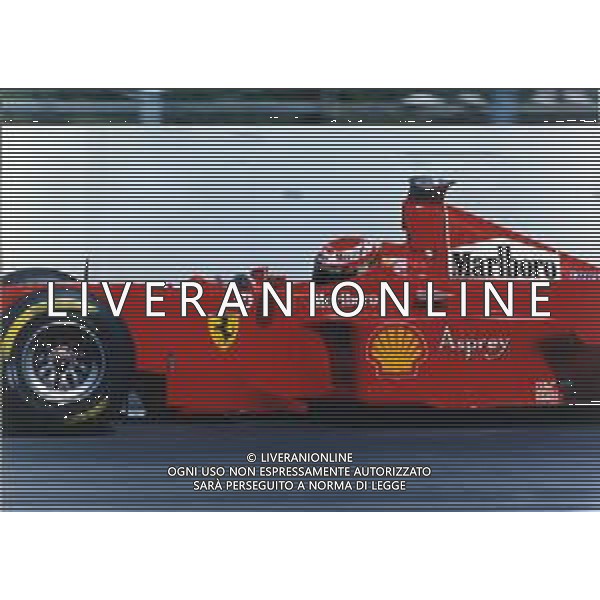 RETROSPETTIVA EDDIE IRVINE PILOTA F1 NELLA FOTO EDDIE IRVINE NEL 1997 CON LA FERRARI F 310 B AG ALDO LIVERANI SAS 
