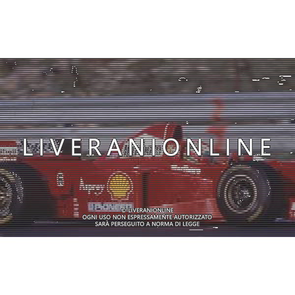 RETROSPETTIVA EDDIE IRVINE PILOTA F1 NELLA FOTO EDDIE IRVINE NEL 1997 CON LA FERRARI F 310 B AG ALDO LIVERANI SAS 