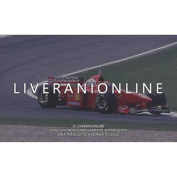 RETROSPETTIVA EDDIE IRVINE PILOTA F1 NELLA FOTO EDDIE IRVINE NEL 1997 CON LA FERRARI F 310 B AG ALDO LIVERANI SAS 