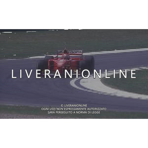 RETROSPETTIVA EDDIE IRVINE PILOTA F1 NELLA FOTO EDDIE IRVINE NEL 1997 CON LA FERRARI F 310 B AG ALDO LIVERANI SAS 