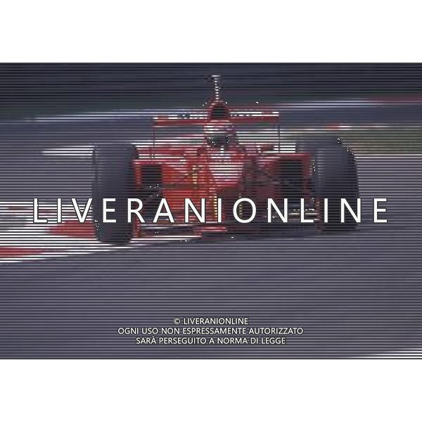 RETROSPETTIVA EDDIE IRVINE PILOTA F1 NELLA FOTO EDDIE IRVINE NEL 1997 CON LA FERRARI F 310 B AG ALDO LIVERANI SAS 
