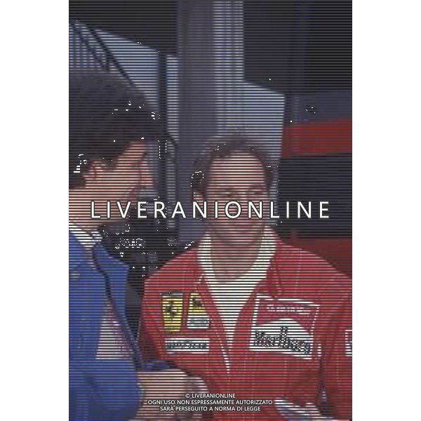 RETROSPETTIVA GERHARD BERGER PILOTA F1 NELLA FOTO GERHARD BERGER NEL 1994 CON LA FERRARI E IL GIORNALISTA PINO ALLIEVI AG ALDO LIVERANI SAS 