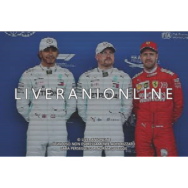 Qualifying top three in parc ferme (L to R): Lewis Hamilton (GBR) Mercedes AMG F1, second; Valtteri Bottas (FIN) Mercedes AMG F1, pole position; Sebastian Vettel (GER) Ferrari, third. 27.04.2019. Formula 1 World Championship, Rd 4, Azerbaijan Grand Prix, Baku Street Circuit, Azerbaijan, Qualifying Day. AG ALDO LIVERANI SAS-ONLY ITALY