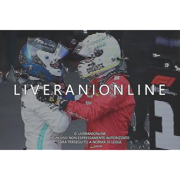 1st place Valtteri Bottas (FIN) Mercedes AMG F1 and 3rd place Sebastian Vettel (GER) Ferrari SF90. 28.04.2019. Formula 1 World Championship, Rd 4, Azerbaijan Grand Prix, Baku Street Circuit, Azerbaijan, Race Day. AG ALDO LIVERANI SAS-ONLY ITALY