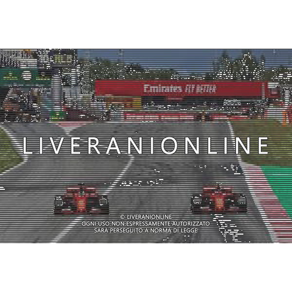 Charles Leclerc (MON) Ferrari SF90 passes team mate Sebastian Vettel (GER) Ferrari SF90. 12.05.2019. Formula 1 World Championship, Rd 5, Spanish Grand Prix, Barcelona, Spain, Race Day. AG ALDO LIVERANI-ONLY ITALY