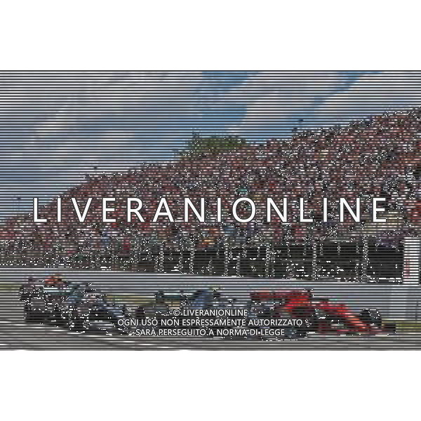 (L to R): Lewis Hamilton (GBR) Mercedes AMG F1 W10, Valtteri Bottas (FIN) Mercedes AMG F1 W10, and Sebastian Vettel (GER) Ferrari SF90 at the start of the race. 12.05.2019. Formula 1 World Championship, Rd 5, Spanish Grand Prix, Barcelona, Spain, Race Day. AG ALDO LIVERANI-ONLY ITALY