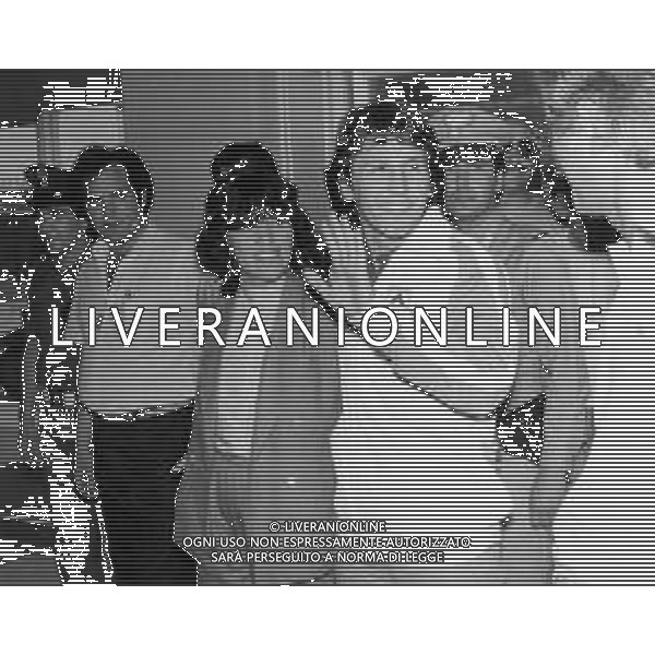 RETROSPETTIVA ZICO PSEUDONIMO DI ARTHUR ANTUNES COIMBRA CALCIATORE NELLA FOTO ZICO PSEUDONIMO DI ARTHUR ANTUNES COIMBRA CON LA MOGLIE A MALPENSA IL GIORNO DEL SUO ARRIVO NUOVO ACQUISTO UDINESE CALCIO AG ALDO LIVERANI SAS