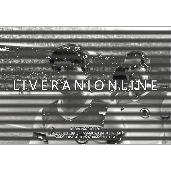 RETROSPETTIVA AGOSTINO DI BARTOLOMEI CALCIATORE NELLA FOTO AGOSTINO DI BARTOLOMEI CON LA MAGLIA DELLA ROMA CALCIO E LUCIANO SPINOSI AG ALDO LIVERANI SAS