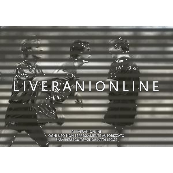 08-05-1991 MILANO- FINALE DI ANDATA DI COPPA UEFA INTER ROMA 2-0 NELLA FOTO ANDREAS BREHME TRATTIENE GIUSEPPE GIANNINI E L\'ARBITRO ALEKSEY SPIRIN AG ALDO LIVERANI SAS