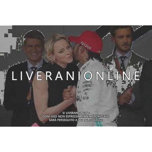 Princess Charlene of Monaco with Lewis Hamilton (GBR) Mercedes AMG F1 W10. 26.05.2019. Formula 1 World Championship, Rd 6, Monaco Grand Prix, Monte Carlo, Monaco, Race Day. AG ALDO LIVERANI SAS-ONLY ITALY