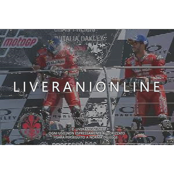 Danilo Petrucci primo classificato MotoGP festeggia con Andrea Dovizioso - Podio MotoGP del Mugello Gran Premio d\'Italia 02.06.2019 ©Alessio Marini / AGENZIA ALDO LIVERANI SAS