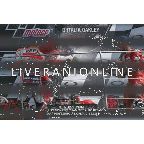 Danilo Petrucci primo classificato MotoGP festeggia con Andrea Dovizioso e Marc Marquez - Podio MotoGP del Mugello Gran Premio d\'Italia 02.06.2019 ©Alessio Marini / AGENZIA ALDO LIVERANI SAS