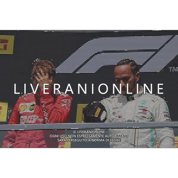 (L to R): second placed Sebastian Vettel (GER) Ferrari on the podium with race winner Lewis Hamilton (GBR) Mercedes AMG F1. 09.06.2019. Formula 1 World Championship, Rd 7, Canadian Grand Prix, Montreal, Canada, Race Day. / AGENZIA ALDO LIVERANI SAS - ITALY ONLY EDITORIAL USE ONLY