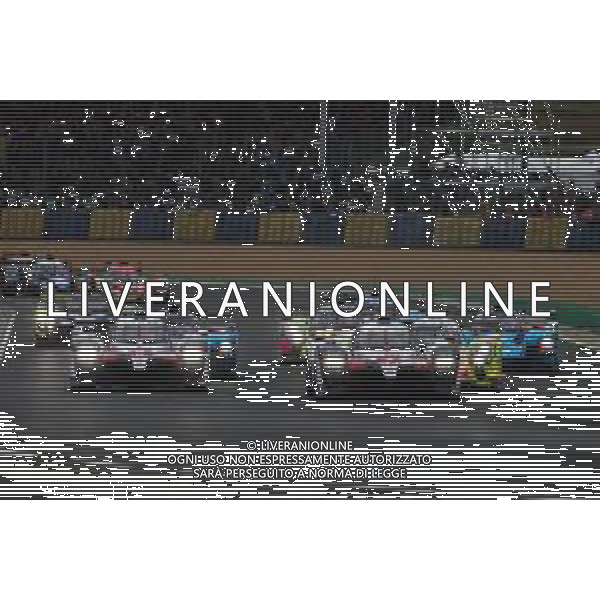 Sebastien Buemi (SUI) / Kazuki Nakajima (JPN) / Fernando Alonso (ESP) #08 Toyota Gazoo Racing Toyota TS050 Hybrid and Sebastien Buemi (SUI) / Kazuki Nakajima (JPN) / Fernando Alonso (ESP) #08 Toyota Gazoo Racing Toyota TS050 Hybrid lead at the start of the race. 15.06.2019. FIA World Endurance Championship, Le Mans 24 Hours, Race, Le Mans, France. Saturday. AG ALDO LIVERANI SAS-ONLY ITALY