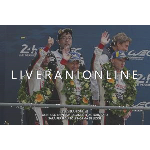 (L to R): Jose Maria Lopez (ARG); Kamui Kobayashi (JPN); and Mike Conway (GBR) #07 Toyota Gazoo Racing Toyota TS050 Hybrid, celebrate second position on the podium. 16.06.2019. FIA World Endurance Championship, Le Mans 24 Hours, Race, Le Mans, France. Sunday.