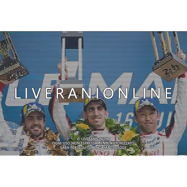 (L to R): Race winners Fernando Alonso (ESP); Sebastien Buemi (SUI); and Kazuki Nakajima (JPN) #08 Toyota Gazoo Racing Toyota TS050 Hybrid celebrate on the podium. 16.06.2019. FIA World Endurance Championship, Le Mans 24 Hours, Race, Le Mans, France. Sunday.
