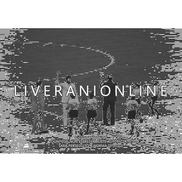 1974 FRANCOFORTE-INAUGURAZIONE DEI CAMPIONATO DEL MONDO DI CALCIO NELLA FOTO 1974 FIFA World Cup in Germany Pele (Edson Arantes do Nascimento) 1940 - Brazilian football player, 1994 Minister of Sports in Brazil Pele alongide Uwe Seeler and children during the opening ceremony of the World Cup in Frankfurt - June 1974 AG ALDO LIVERANI SAS