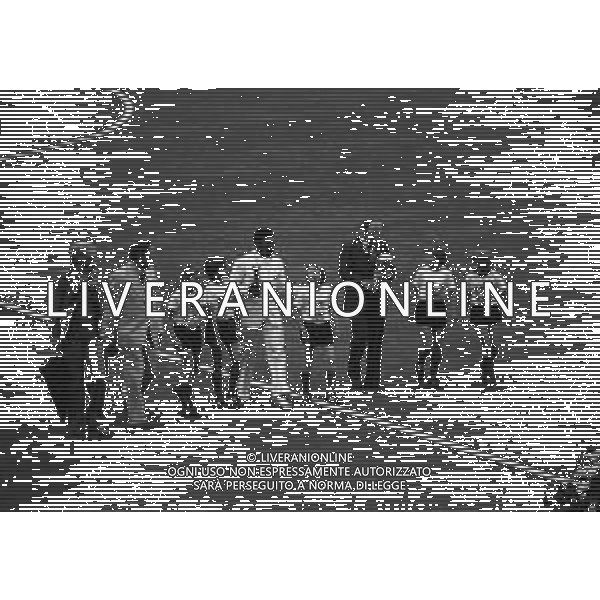 1974 FRANCOFORTE-INAUGURAZIONE DEI CAMPIONATO DEL MONDO DI CALCIO NELLA FOTO 1974 FIFA World Cup in Germany Pele (Edson Arantes do Nascimento) 1940 - Brazilian football player, 1994 Minister of Sports in Brazil Pele alongide Uwe Seeler and children during the opening ceremony of the World Cup in Frankfurt - June 1974 AG ALDO LIVERANI SAS