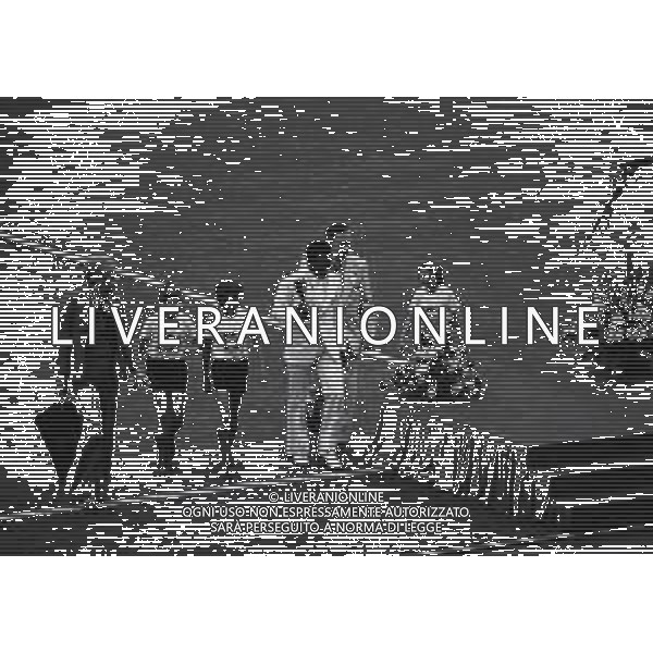 1974 FRANCOFORTE-INAUGURAZIONE DEI CAMPIONATO DEL MONDO DI CALCIO NELLA FOTO 1974 FIFA World Cup in Germany Pele (Edson Arantes do Nascimento) 1940 - Brazilian football player, 1994 Minister of Sports in Brazil Pele alongide Uwe Seeler and children during the opening ceremony of the World Cup in Frankfurt - June 1974 AG ALDO LIVERANI SAS