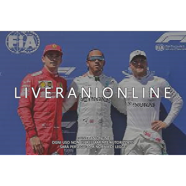 Qualifying top three in parc ferme (L to R): Valtteri Bottas (FIN) Mercedes AMG F1, second; Lewis Hamilton (GBR) Mercedes AMG F1, pole position; Charles Leclerc (MON) Ferrari, third. 22.06.2019. Formula 1 World Championship, Rd 8, French Grand Prix, Paul Ricard, France, Qualifying Day. / AGENZIA ALDO LIVERANI SAS - ITALY ONLY EDITORIAL USE ONLY
