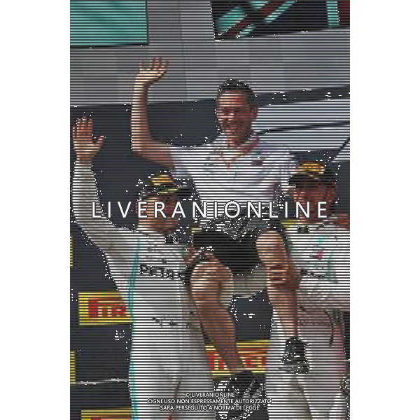 The podium (L to R): second placed Valtteri Bottas (FIN) Mercedes AMG F1 celebrates with Nathan Divey (GBR) Mercedes AMG F1 No1 Mechanic and race winner Lewis Hamilton (GBR) Mercedes AMG F1. 23.06.2019. Formula 1 World Championship, Rd 8, French Grand Prix, Paul Ricard, France, Race Day. / AGENZIA ALDO LIVERANI SAS - ITALY ONLY EDITORIAL USE ONLY