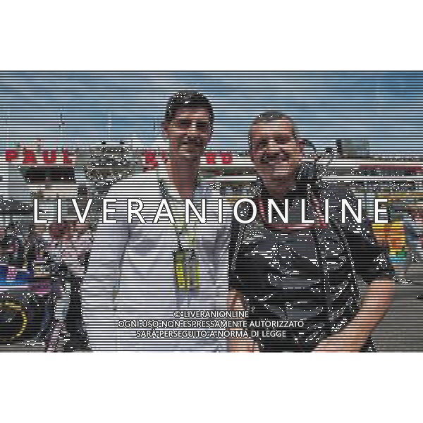 Guenther Steiner (ITA) Haas F1 Team Prinicipal with a guest on the grid. 23.06.2019. Formula 1 World Championship, Rd 8, French Grand Prix, Paul Ricard, France, Race Day. AG ALDO LIVERANI SAS-ONLY ITALY