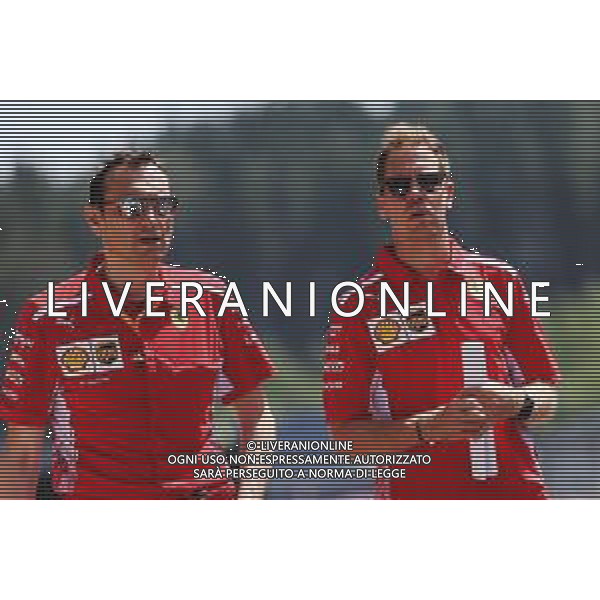 Sebastian Vettel (GER) Ferrari walks the circuit with Riccardo Adami (ITA) Ferrari Race Engineer. 27.06.2019. Formula 1 World Championship, Rd 9, Austrian Grand Prix, Spielberg, Austria, Preparation Day. AG ALDO LIVERANI SAS-ONLY ITALY