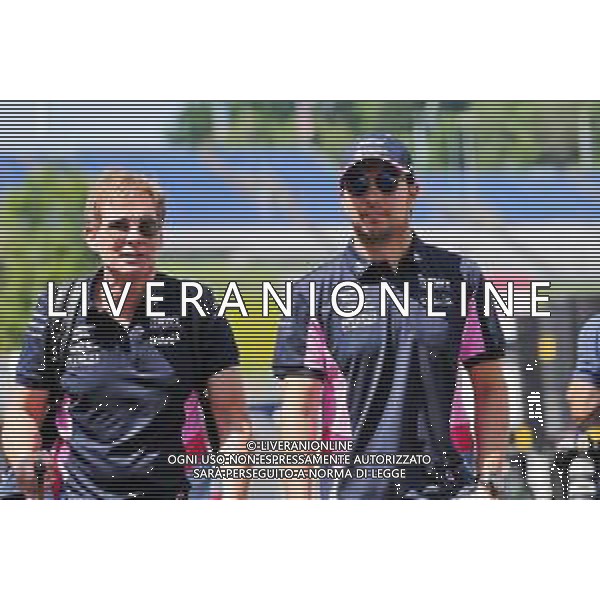 Sergio Perez (MEX) Racing Point F1 Team with Xavi Martos (ESP) Racing Point F1 Team Physio. 27.06.2019. Formula 1 World Championship, Rd 9, Austrian Grand Prix, Spielberg, Austria, Preparation Day. AG ALDO LIVERANI SAS-ONLY ITALY