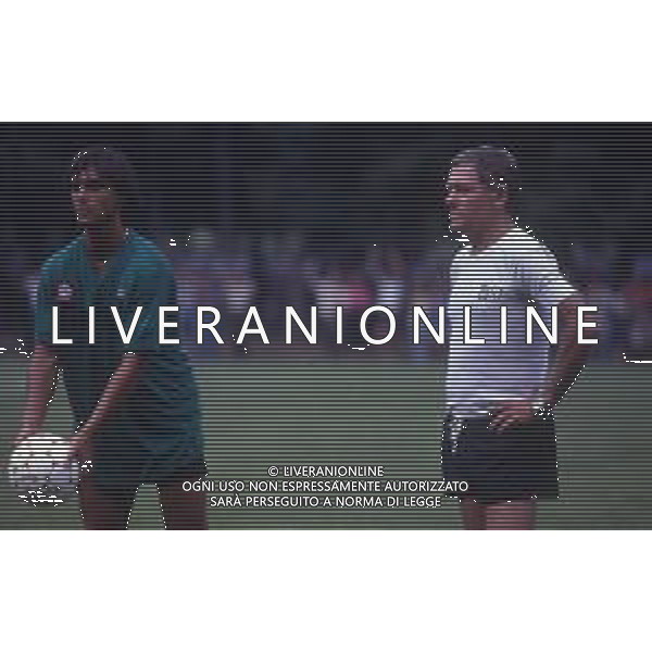RETROSPETTIVA GIUSEPPE GIANNINI CALCIATORE NELLA FOTO GIUSEPPE GIANNINI CON L\'ALLENNATORE LUIGI RADICE IN ALLENAMENTO CON LA ROMA CALCIO AG ALDO LIVERANI SAS