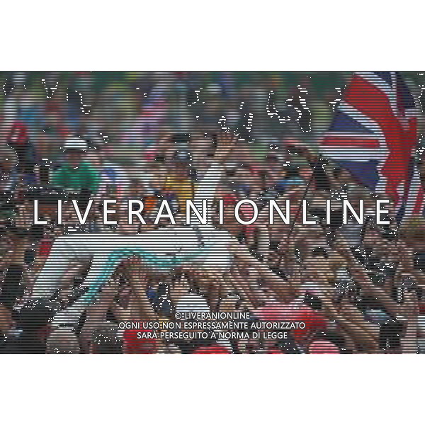 1st place Lewis Hamilton (GBR) Mercedes AMG F1 W10 crowd surfing. 14.07.2019. Formula 1 World Championship, Rd 10, British Grand Prix, Silverstone, England, Race Day. / AGENZIA ALDO LIVERANI SAS - ITALY ONLY EDITORIAL USE ONLY