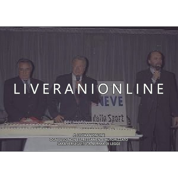 04-10-1996 MILANO FESTA DELLA NEVE ORGANIZZATA DALLA GAZZETTA DELLO SPORT NELLA FOTO IL PRESIDENTE FISI CARLO VALENTINO CON IL DIRETTORE DELLA GAZZETTA DELLO SPORT CANDIDO CANNAVO\' E GIANNI MERLO AG ALDO LIVERANI SAS