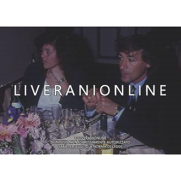 MILANO 1990-FESTA INTER PER LA VITTORIA DELLA COPPA UEFA NELLA FOTO LUCIANO BODINI CON LA MOGLIE AG ALDO LIVERANI SAS