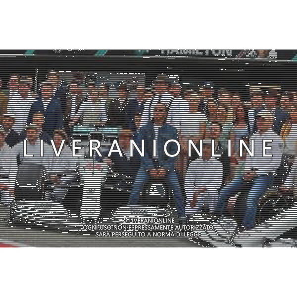 Lewis Hamilton (GBR) Mercedes AMG F1, Toto Wolff (GER) Mercedes AMG F1 Shareholder and Executive Director; Valtteri Bottas (FIN) Mercedes AMG F1, and the team wear vintage clothing to celebrate 125 years in motorsport. 28.07.2019. Formula 1 World Championship, Rd 11, German Grand Prix, Hockenheim, Germany, Race Day. AG ALDO LIVERANI SAS-ONLY ITALY