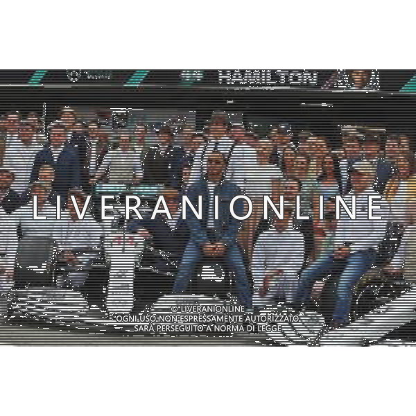 Lewis Hamilton (GBR) Mercedes AMG F1, Toto Wolff (GER) Mercedes AMG F1 Shareholder and Executive Director; Valtteri Bottas (FIN) Mercedes AMG F1, and the team wear vintage clothing to celebrate 125 years in motorsport. 28.07.2019. Formula 1 World Championship, Rd 11, German Grand Prix, Hockenheim, Germany, Race Day. AG ALDO LIVERANI SAS-ONLY ITALY